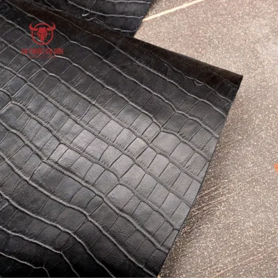 Da bò dập vân cá sấu bụng màu đen thương hiệu Da Thuộc Sài Gòn chất da đanh dẻ độ dày từ 1.4 mm đến 1.6 mm phù hợp may túi xách ví da giày dép cao cấp
