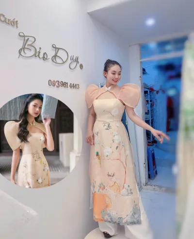 Áo dài cách tân cam sữa tay búp sen