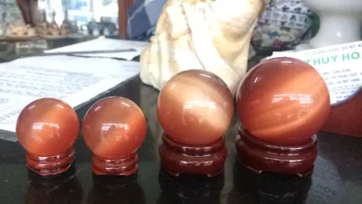 Quả cầu phong thủy đá mắt mèo đỏ - Đường kính 3,5cm; 4,5cm; 5,5cm