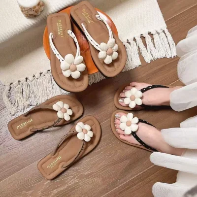 Dép tông nữ hoa cúc đi biển không đứt dai bền dép sỏ ngón đế thấp home mã qv565
