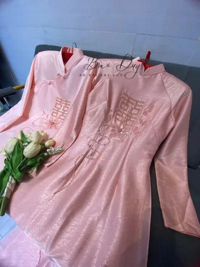 Áo dài hỏi cưới hồng cặp