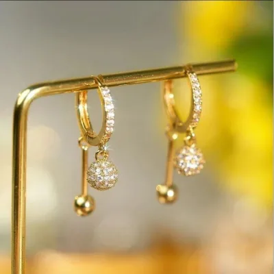 Bông tai titan hợp kim cho phụ nữ niche cao cấp trang sức vàng thanh lịch thời trang đa năng